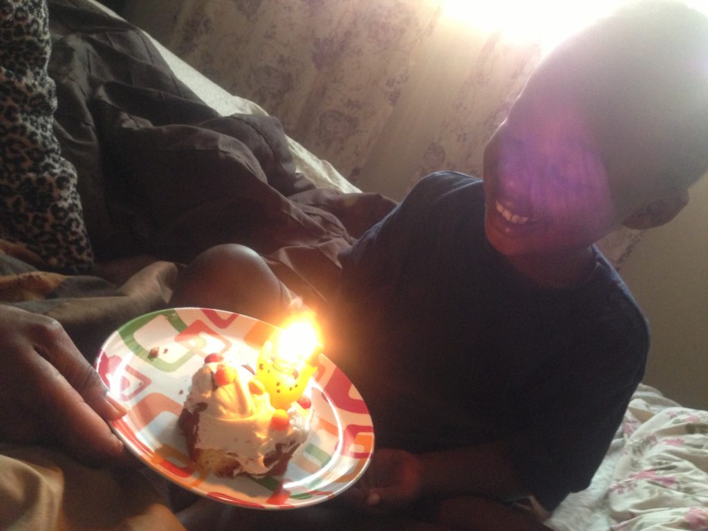 Dami with Birthday Cake in Bed